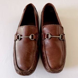 Size 10M Brown Clark’s (Moccasin Style) Slip on‘s. With rubber bottom.